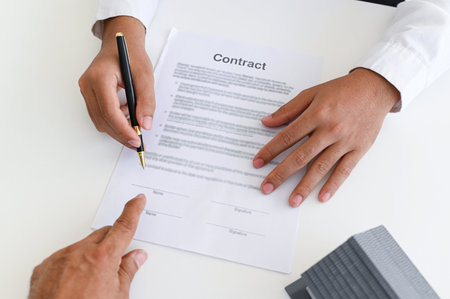 Signing a business contract or a lawyer advises legal signing, litigation agreements.の写真素材