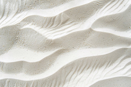 Abstract beachscape, featuring white clean textured sand as the focal point with a top view, background for various design projects.の素材