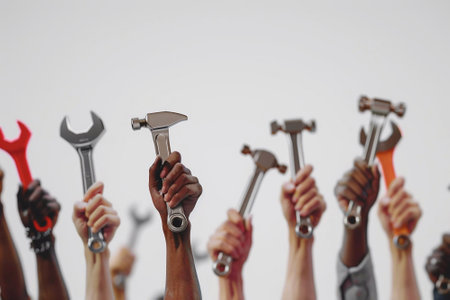 3D rendered image of hands holding tools in honor of Labor Day, white backgroundの素材