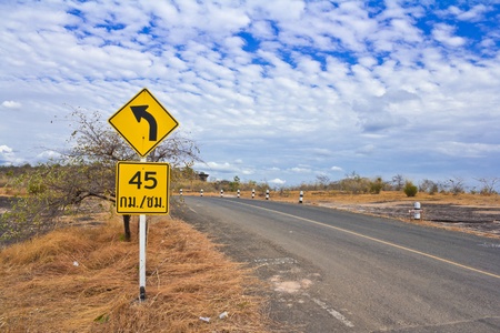 Yellow Curve Warning Roadの写真素材