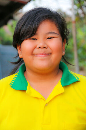 Adorable little girl smiling at cameraの写真素材