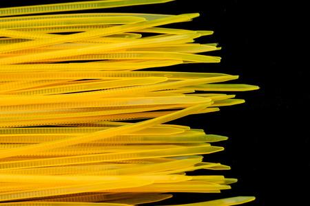 Yellow Nylon Cable Ties on black Background