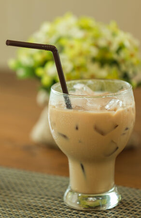 Ice coffee in with straw glassの写真素材