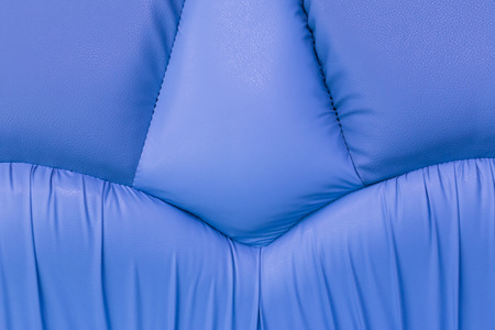 Backgrounds of purple leather sofa with stitch textureの写真素材