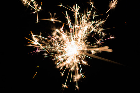Celebrate party sparkler little fireworks on black background. use for Christmas and New year other celebration .の写真素材