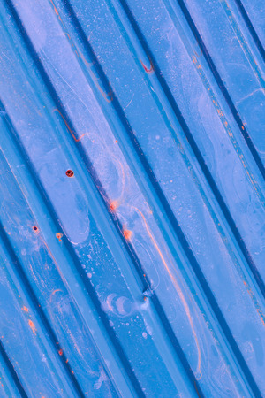 Old blue zinc wallの写真素材