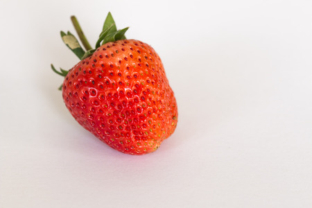 Close up Ripe strawberries on a white backgroundの写真素材