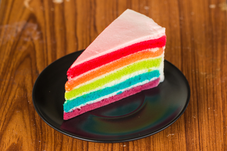 colorful cake on black plateの写真素材