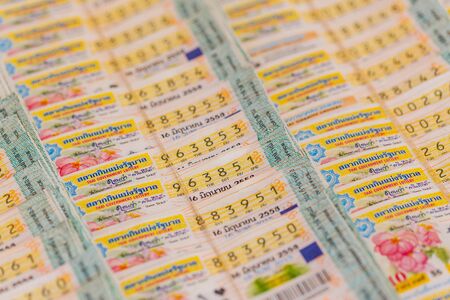 CHONBURI, THAILAND â JUNE 12, 2015: Thai government lottery in Sattahip market .The government Thai lottery was start controlled price at eighty baht in June 2015のeditorial素材