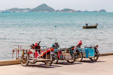 SATTAHIP , THAILAND â JULY 25, 2015 : The Saleng or motorcycle on the Harbour Bridge. It is Vehicles for fishermen in Sattahip, Thailand on July 25, 2015のeditorial素材