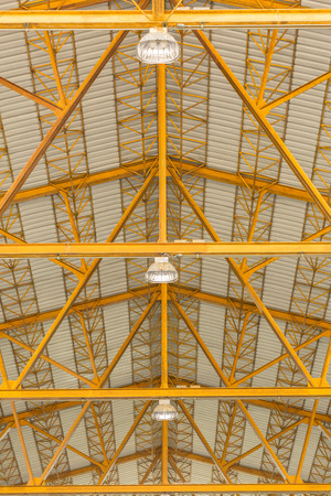 Lamp and yellow metal roofの写真素材