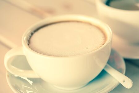 Close up foamof Hot cappuccino in cupの写真素材