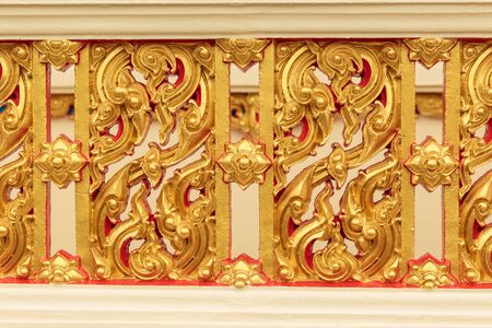 Traditional Thai style pattern decorative temple wall in Thailand