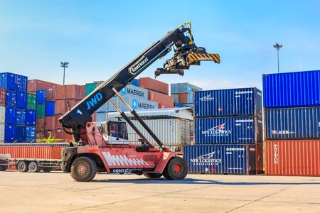 LAEM CHABANG, THAILAND - APRIL 30, 2016: The fantuzzi contstacker working at Laem Chabang Industrial Estate early in the morning in Laem Chabang, Thailand on April 17, 2015のeditorial素材