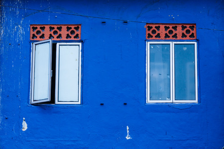 Beautiful blue wall and windowsの写真素材