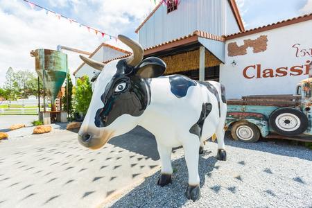 PATTAYA, THAILAND - SEPTEMBER 30, 2016 : Cow statue at the Swiss Sheep Farm Where is the biggest sheep farm and fun park style in Pattayaのeditorial素材