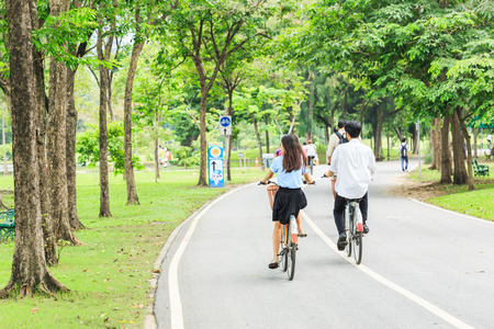 BANGKOK, THAILAND - OCTOBER 06, 2016: Unidentified men and women  cycling and walking in the Vachirabenjatus Park or Train park in Bangkok thailand.のeditorial素材
