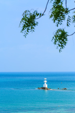 sea and lighthouse at Smaesarn in Thailandの写真素材
