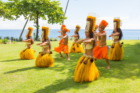 PAPEETE, FRENCH POLYNESIA - APRIL 7, 2017: Polynesian women perform traditional dance in Tahiti Papeete, French Polynesia. Polynesian dances are major tourist attraction of luxury resorts of French Polynesia.のeditorial素材