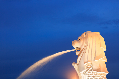 SINGAPORE - APRIL 7 , 2017 : Close up Original Merlion statue fountain in Merlion Park, Singapore. This sculpture fountain is one of most well known icons of Singapore and is most important symbol, trademark of country.のeditorial素材