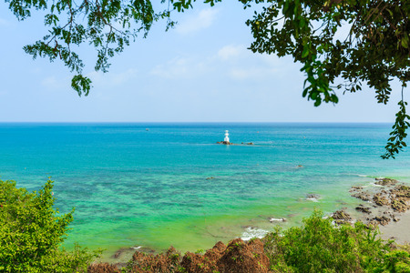 sea and lighthouse at Smaesarn in Thailandの写真素材