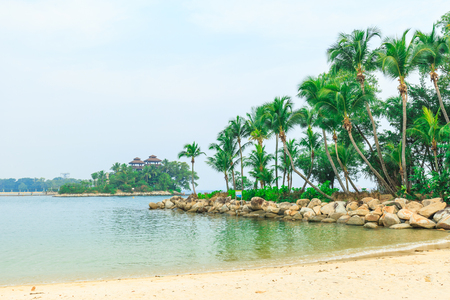 SENTOSA, SINGAPORE - MAY 22, 2017 :  Siloso Beach in the Sentosa island resort of Singapore. It is an artificial beach with a sand taken from Malaysia and Indonesia.のeditorial素材