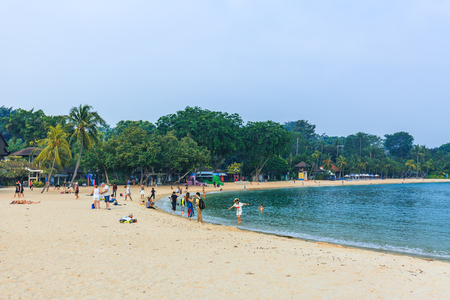SENTOSA, SINGAPORE - MAY 29, 2017 :  Siloso Beach in the Sentosa island resort of Singapore. It is an artificial beach with a sand taken from Malaysia and Indonesia.のeditorial素材