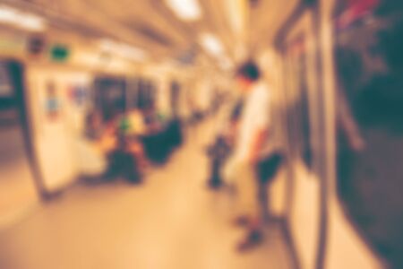 Blurred photo of passengers in sky trainの写真素材