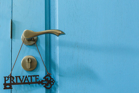 Private tag hanging on door handlesの写真素材