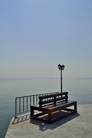 Bench by the sea の写真素材