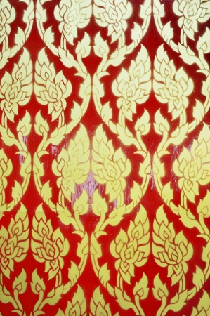 flower pattern in  Thai style art on window of the templeの写真素材