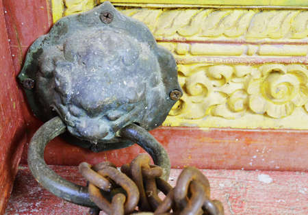 Old thai style lion s head locker in the tampleの写真素材