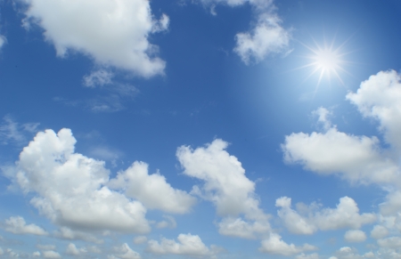 blue sky with clouds and sunの写真素材