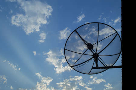 satellite dish with the blue sky backgroundの写真素材