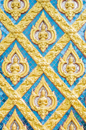 thai art carving angle on wall in temple ,thailandの写真素材