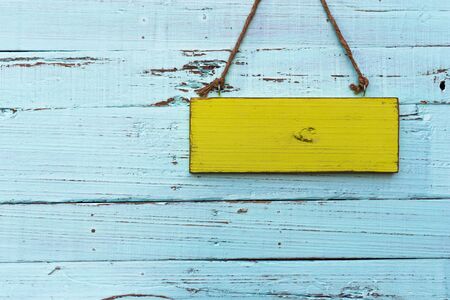 Wooden signboard on wooden wall. vintage style.の写真素材