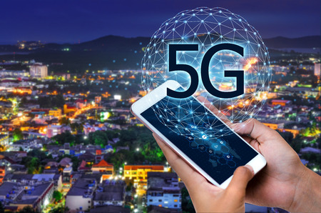 phone computer 5g Earth businessman connect worldwide waiter hand holding an empty digital tablet with smart and 5G network connection conceptの写真素材
