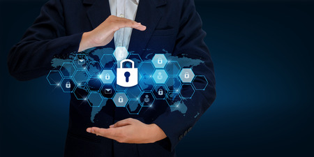lock In the hands of a businessman Shield the shield to protect the cyberspace.Space input data Data...