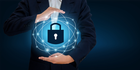 lock In the hands of a businessman Shield the shield to protect the cyberspace.Space input data Data Security Business Internet Concept. Secure informationの写真素材