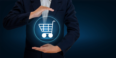 hand businessman Cart Shopping technology world digital Shopping order transactions on the internet  Trading on the world online pay dept. Blue toneの写真素材