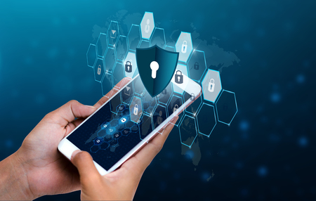 Unlocked smartphone lock Internet phone hand Businesspeople press the phone to communicate in the Internet. Cyber security concept hand protection network with lock icon and virtual screens Space put message Blue toneの写真素材