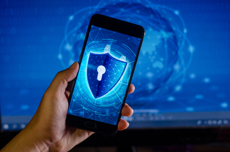 Shield Internet phone Smartphone is protected from hacker attacks, Firewall Businesspeople press the...