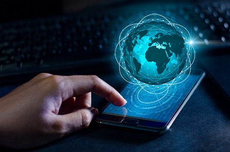 Smart Phones and Globe Connections Uncommon communication world Internet Businesspeople press the phone to communicate in the Internet. Space put message Blue toneの写真素材
