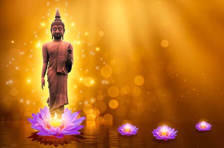 Buddha statue water lotus Buddha standing on lotus flower on orange backgroundの写真素材