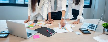 Business people are meeting and graphing business growth on a deskの写真素材