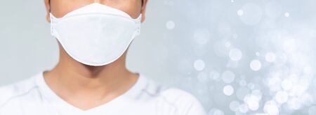 Men wearing masks to protect the coronavirus covid-19の写真素材