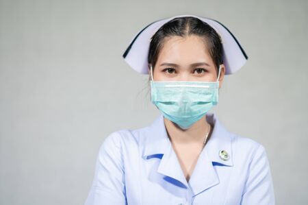 Nurses wear masks to protect against coronavirus covid19の写真素材