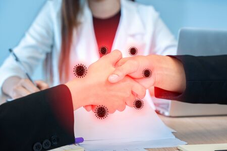 covid19 corona virus shaking hands People shaking hands and having a virus at hand banの写真素材