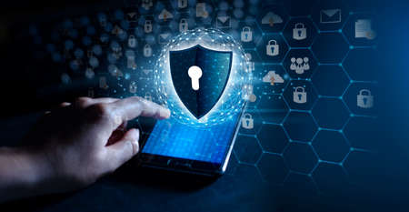 shield with key inside on blue background The concept of cybersecurity the Internetの写真素材
