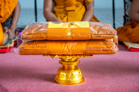 set of monk's robes placed on the pedestalの写真素材